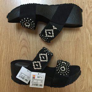 Desigual slip on sandals with black and ivory beads
